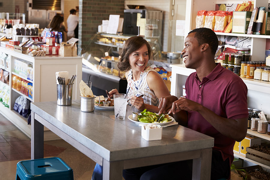 couple enjoying lunch at a fast casual restaurant